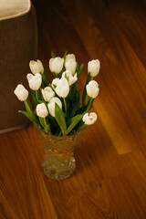 white flowers tulips in a vase