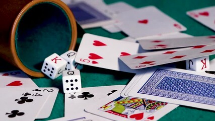 poker cards falling on the gaming table