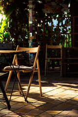 cozy summer cafe, restaurant, with a stylish interior and furniture