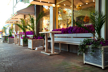 cozy summer cafe, restaurant, with a stylish interior and furniture