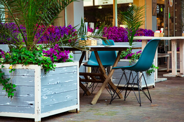 cozy summer cafe, restaurant, with a stylish interior and furniture
