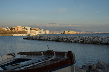 Fototapeta premium dam and boat with the castle of naples