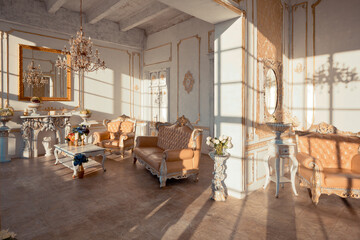 rich apartment interior with golden baroque decorations on the walls and luxury furniture. the room is flooded with the rays of the setting sun