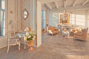 rich apartment interior with golden baroque decorations on the walls and luxury furniture. the room is flooded with the rays of the setting sun