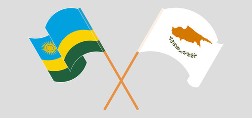 Crossed and waving flags of Rwanda and Cyprus