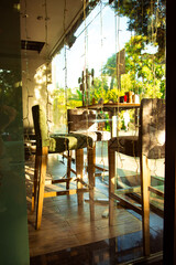 cozy summer cafe, restaurant, with a stylish interior and furniture