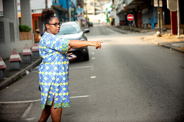 portrait of a beautiful mature businesswoman showing something.