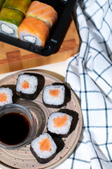 Sushi set and chopsticks on napkin
