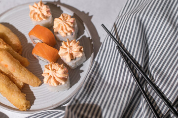 Japanese sushi rolls served on plate