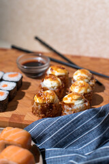 Sushi set and chopsticks on napkin