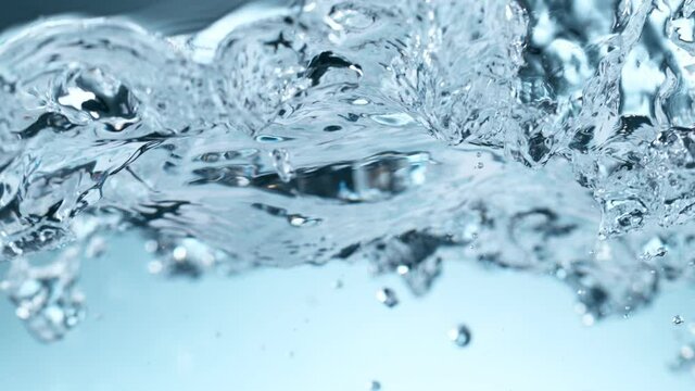 Super slow motion of bubbling water in detail. Filmed on high speed cinema camera, 1000 fps.