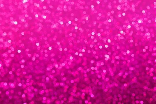 Abstract purple and pink glitter lights background. Circle blurred bokeh. Romantic backdrop for Valentines day, womens day, holiday or event