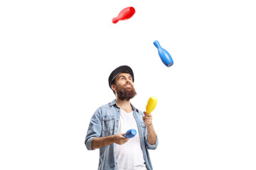 Bearded man juggling with clubs