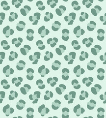 Fototapeta na wymiar Vector seamless pattern of mint colored hand drawn leopard dotted fur print isolated on white background