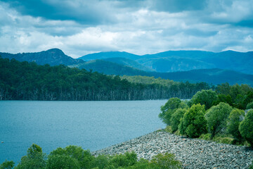 The Hinze Dam is a rock and earth-fill embankment dam with an un-gated spillway across the Nerang...