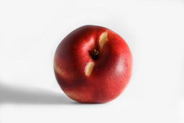 red juicy peach on a white background, fruit