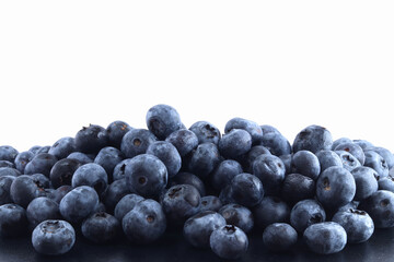 fresh blueberries on a white background, sweet berries