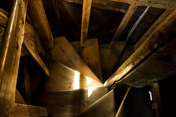 Wooden ancient spiral staircase in an old building. Old Tower stariway