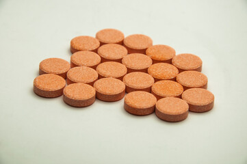 pills on a gray background. medicinal capsules on the table. treatment concept. many vitamins