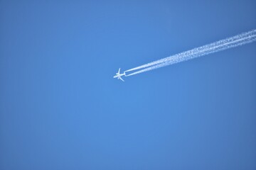 Airplane leaving trace in the sky