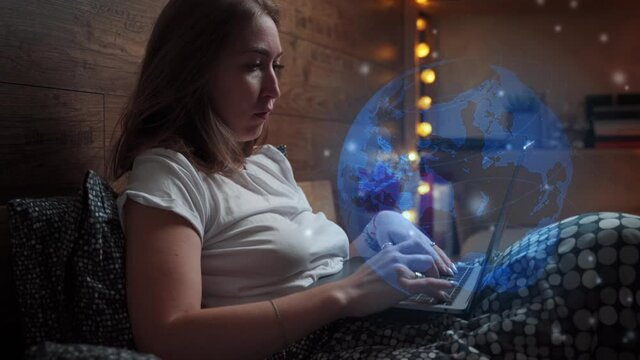 Distant Communication network Concept. Woman typing on laptop work at home. World map animation hologram.