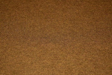 Fototapeta na wymiar Texture of a brown cotton canvas as a background.