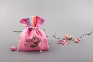 Korean traditional wrapping cloth gift box with decorations.