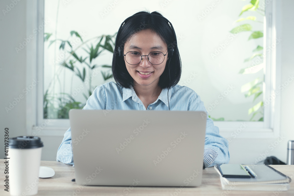 Poster asian business woman making facetime video conference via laptop computer using zoom online meeting 