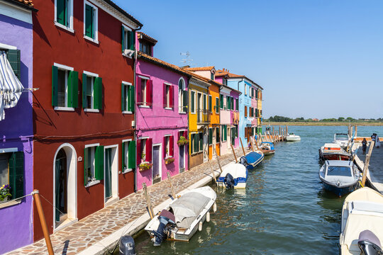 Tradition colorful houses along Rio del Pontinello canal in Burano, Venice, Italy