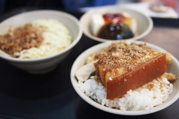 Taiwanese Braised Minced Pork Rice or Pork Belly Rice and bean curd and century egg in Taiwan