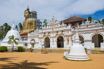 At the entrance to the ancient Buddhist temple Wewrukannala Buduraja Maha Viharaya. Dikwella, Sri Lanka