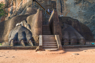 Lion paws at the beginning of the rise to the top of the ancient mountain-palace of Sigiria