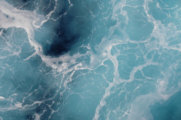 Sea water with air swirls in the Eastern Mediterranean Sea creating blue and white patterns