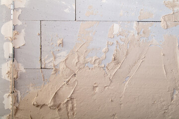 Wall covered with plaster as an abstract background.