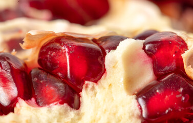 Ripe red pomegranate as background.