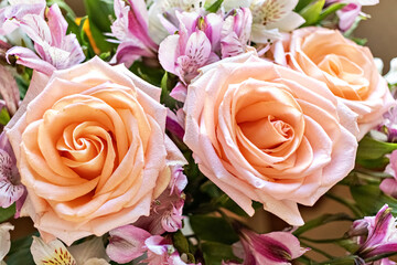 Background of a bouquet of pink roses. The concept of Valentine's day, birthday, International Women's Day. Design of holidays.