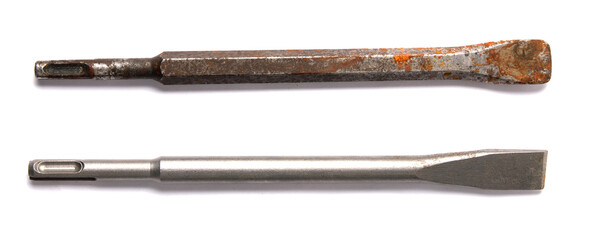 two a chisel from a perforator is isolated on white background .old and new.