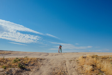 love, couple kissing in simple landscape