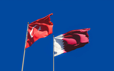 Flags of Qatar and Turkey.