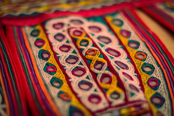art embroidery,decorations kutch art,beautiful view of embroidery,colorful ahir bharat,embroidered handicrafts close-up,selective focus,rajasthan embroidery flower and pattern art