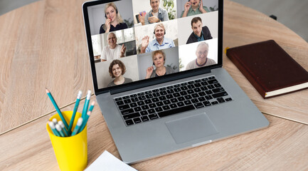 Fototapeta na wymiar Many portraits faces of diverse young and aged people webcam view, while engaged in videoconference on-line meeting lead by businessman leader. Group video call application easy usage concept