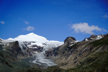 wonderful mountain landscape with a glacier and blue sky