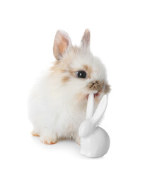Fototapeta na wymiar Cute rabbit and decorative figurine on white background