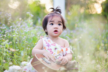 Cute girl smiling brightly in the setting sun