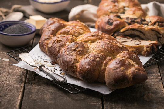 Tsoureki braid, greek easter sweet bread, on wood