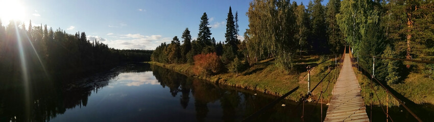 Sloboda, Sverdlovsk region, Russia - 09.09.2020: summer landscape on the river Chusovoy in the village of Sloboda. Photo with copy space. Russian nature background. Banner size