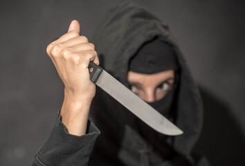 an attacker with a knife