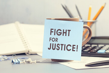 Fight for Justice - concept of text on sticky note