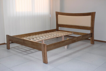 assembly of a double bed made of wood