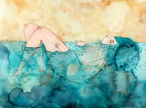 A woman lying in the water 